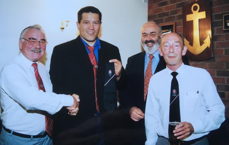 Bill Carne and Zinzan Brooke with Milford Haven officials